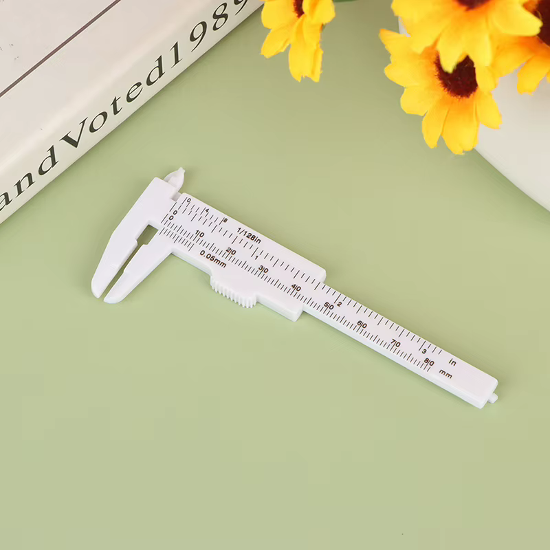 Pied à coulisse portable en plastique à double échelle 80 mm pour la mesure des sourcils, outil de m