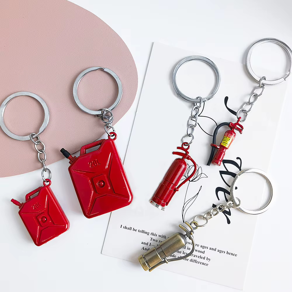 Porte-clés de pompier en forme de tambour d'huile rouge