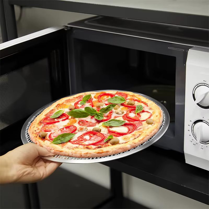 Poêle à pizza ronde en alliage d'aluminium avec trous