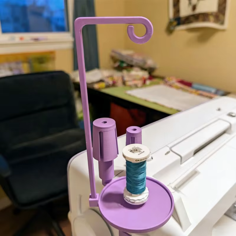 Support de fil pour machine à coudre