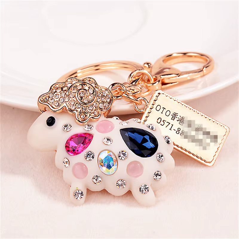 Porte-clés mouton en strass blancs