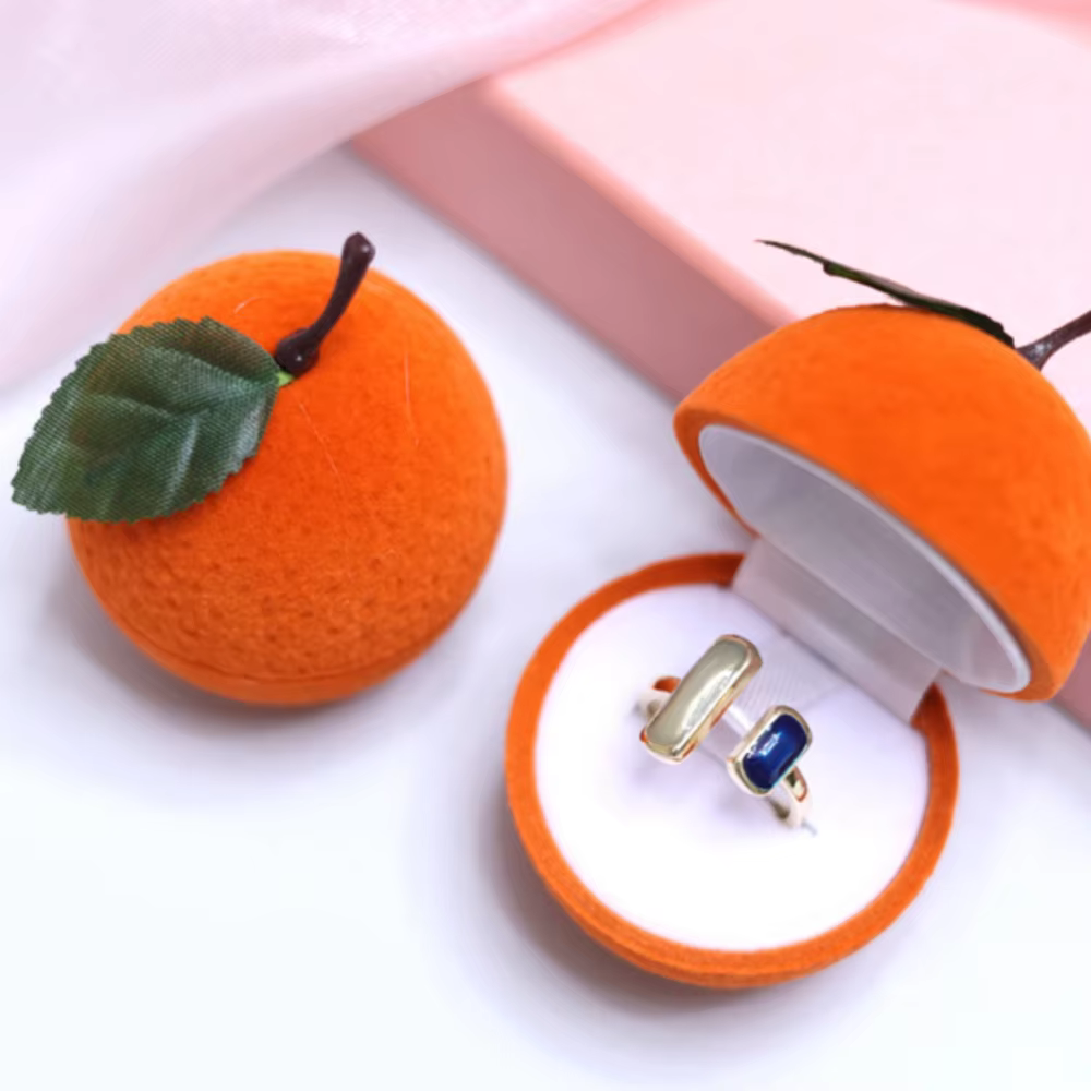 Boîte à bagues orange anti-poussière