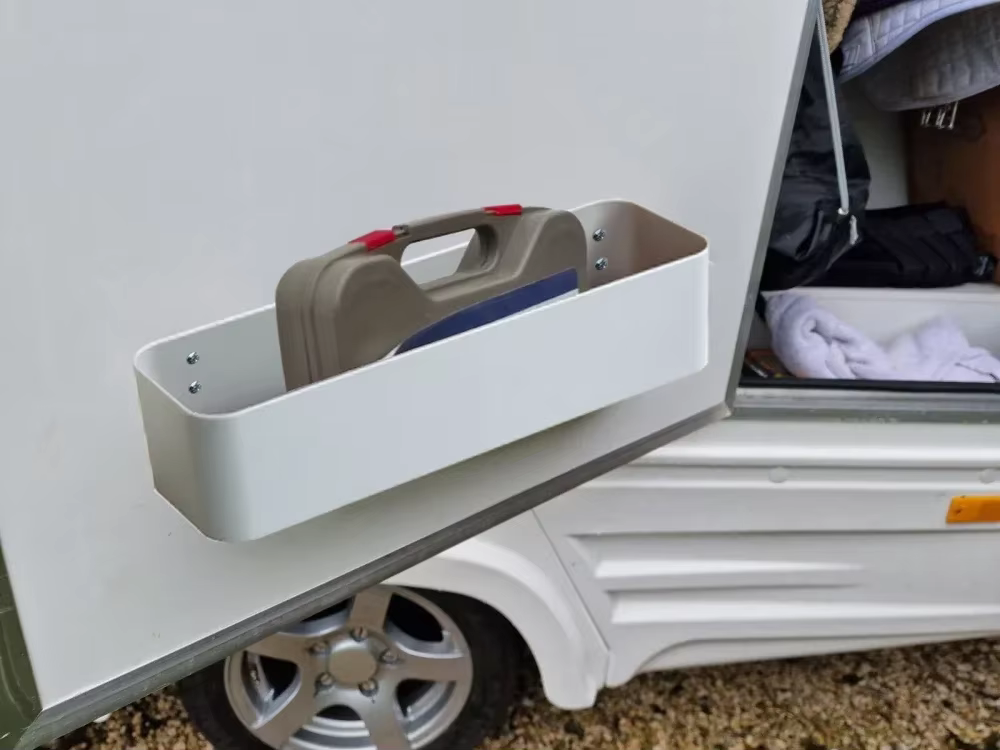 Sangle à cliquet universelle pour le stockage d'outils