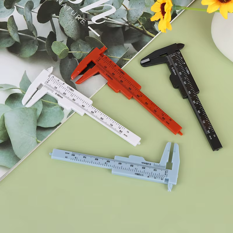 Pied à coulisse portable en plastique à double échelle 80 mm pour la mesure des sourcils