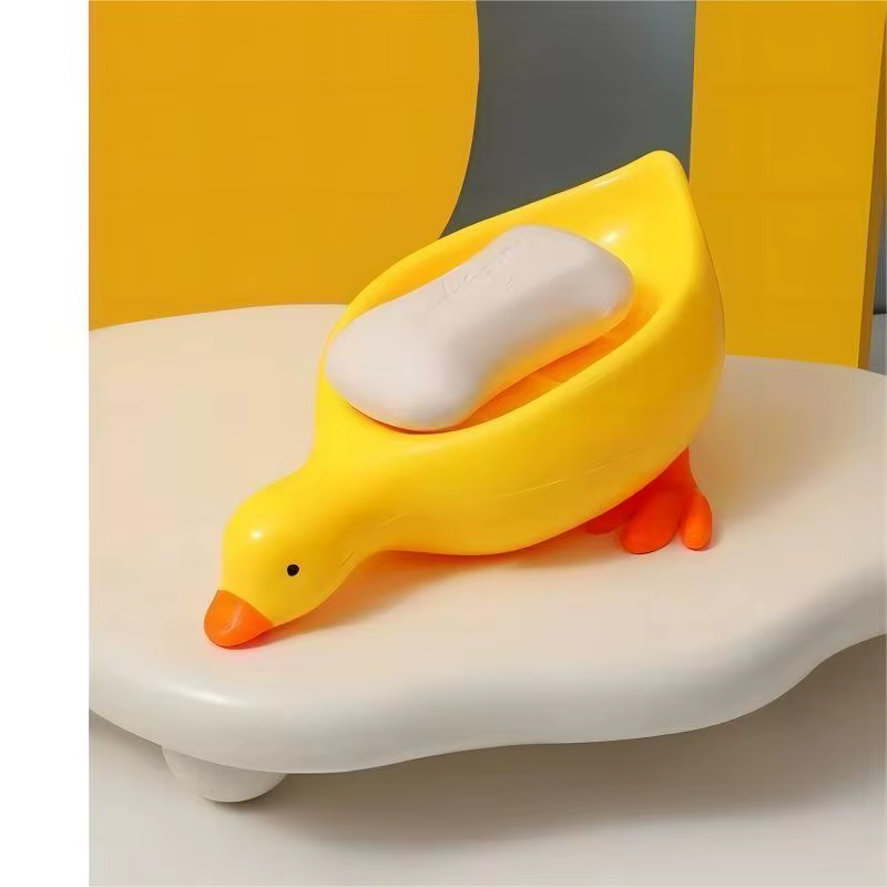 Support à savon auto-drainant en forme de canard