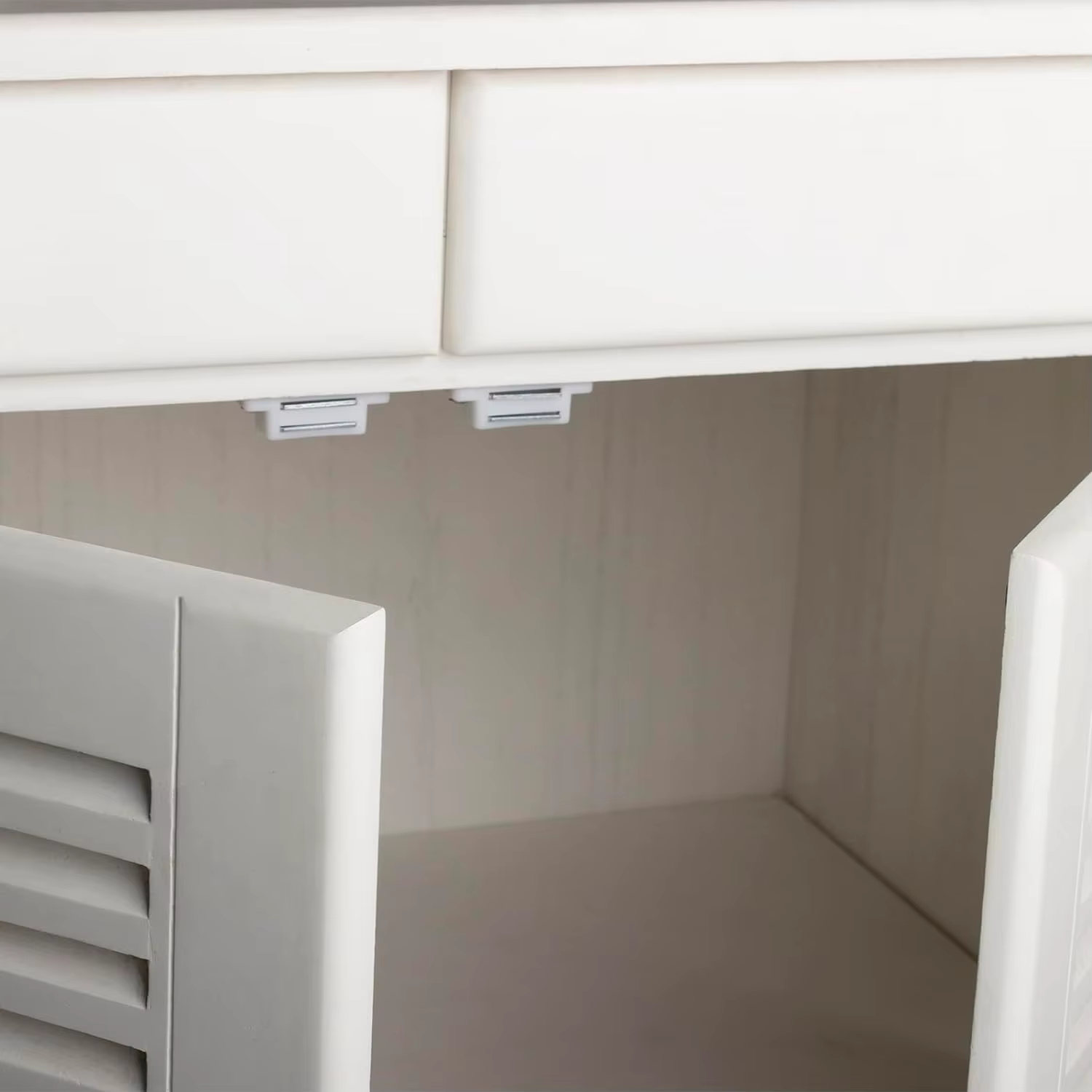 Loquet magnétique pour porte d'armoire de cuisine