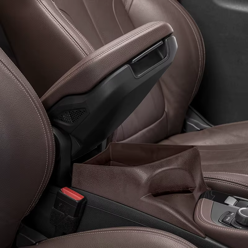 Boîte de rangement pour accoudoir de voiture