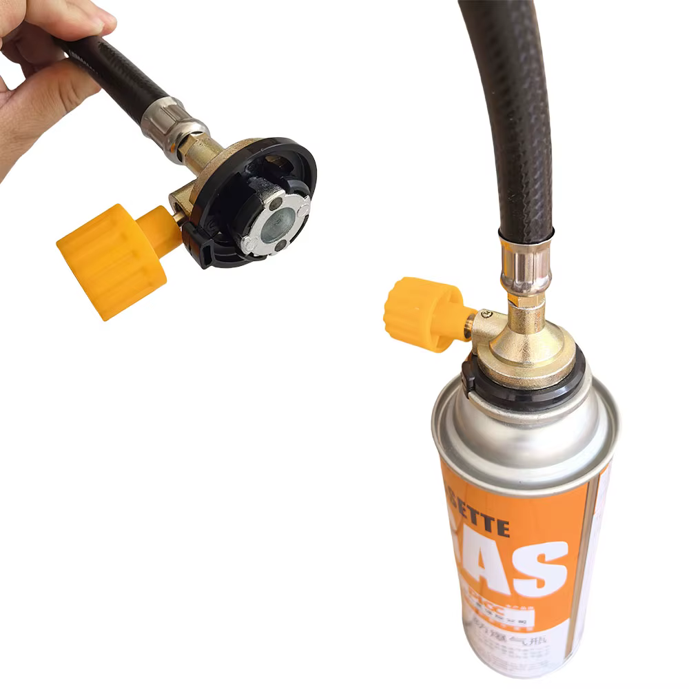 Adaptateur de recharge de gaz