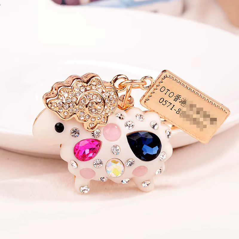 Porte-clés mouton en strass blancs