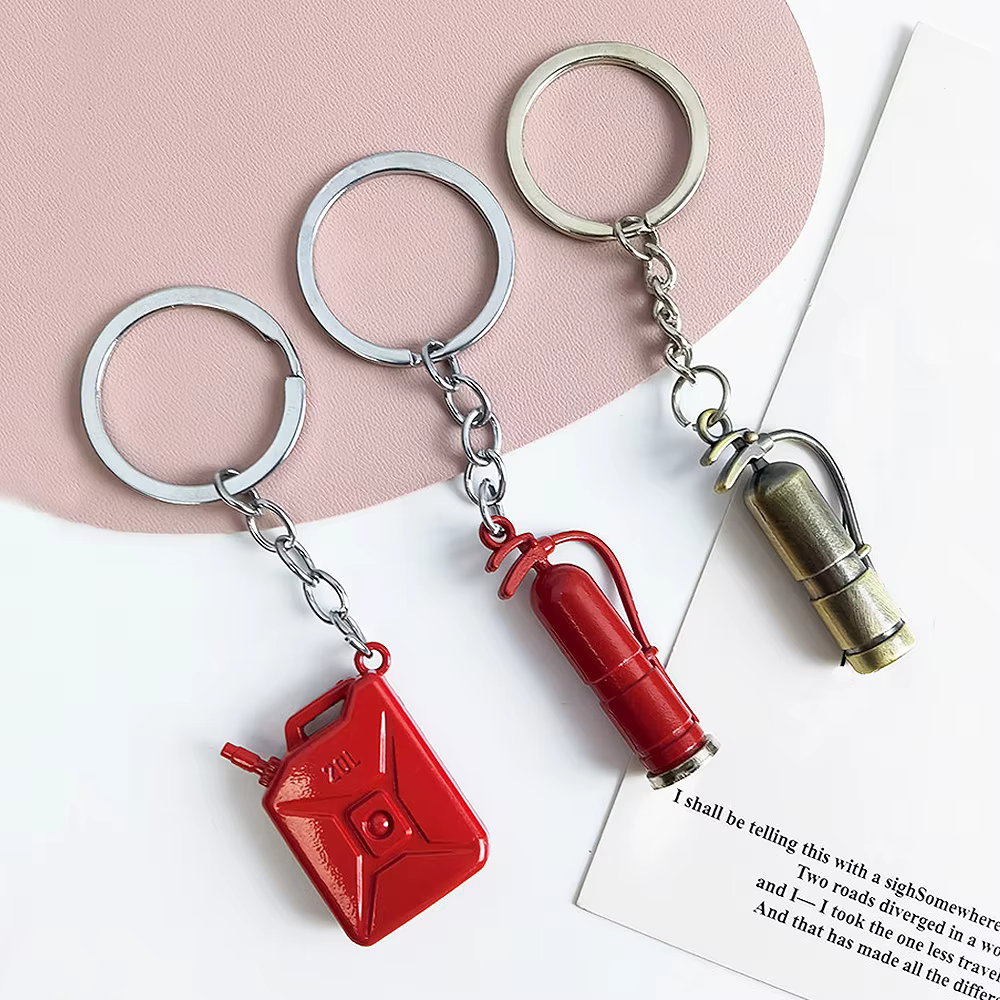 Porte-clés de pompier en forme de tambour d'huile rouge