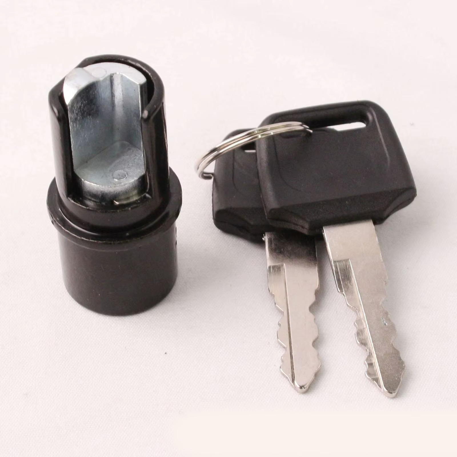Serrure pour lit de camion enroulable