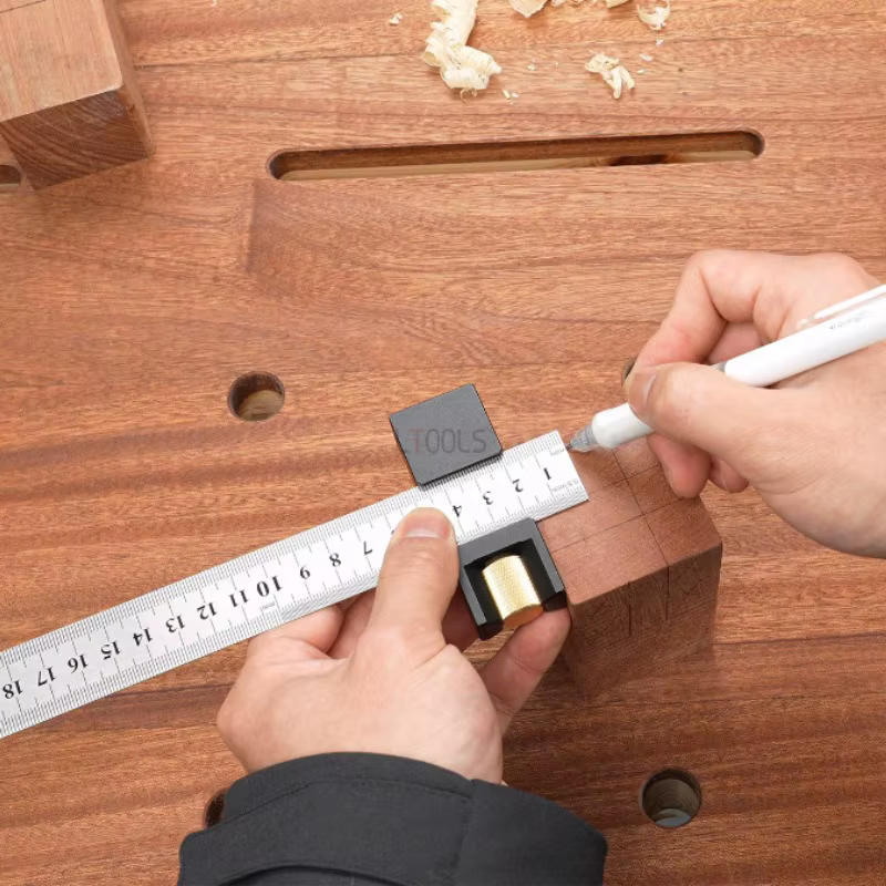 Règle de marquage et de positionnement avec bloc coulissant fixe