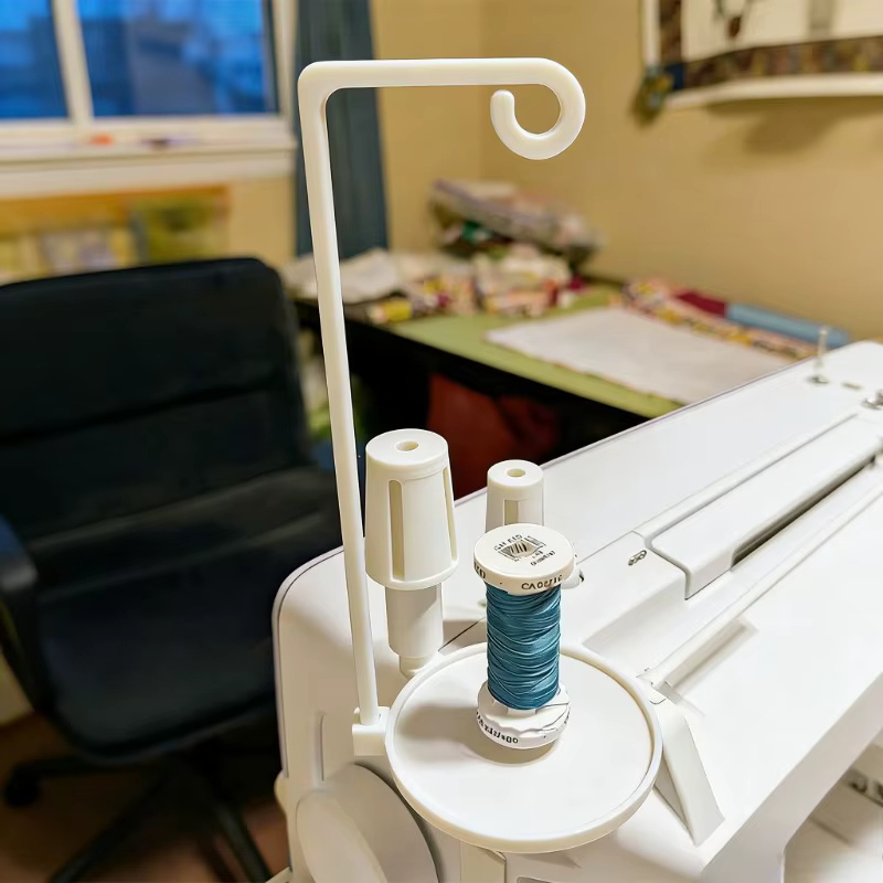 Support de fil pour machine à coudre