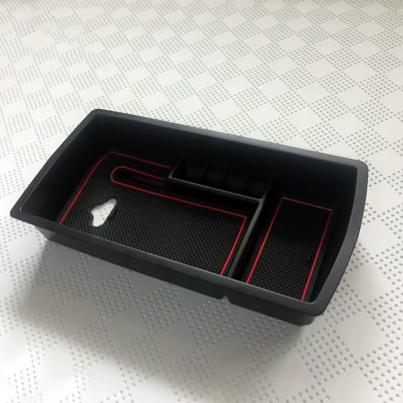 Boîte de rangement pour accoudoir central
